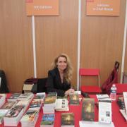 Fabienne Gruckert au stand de son éditeur TDO